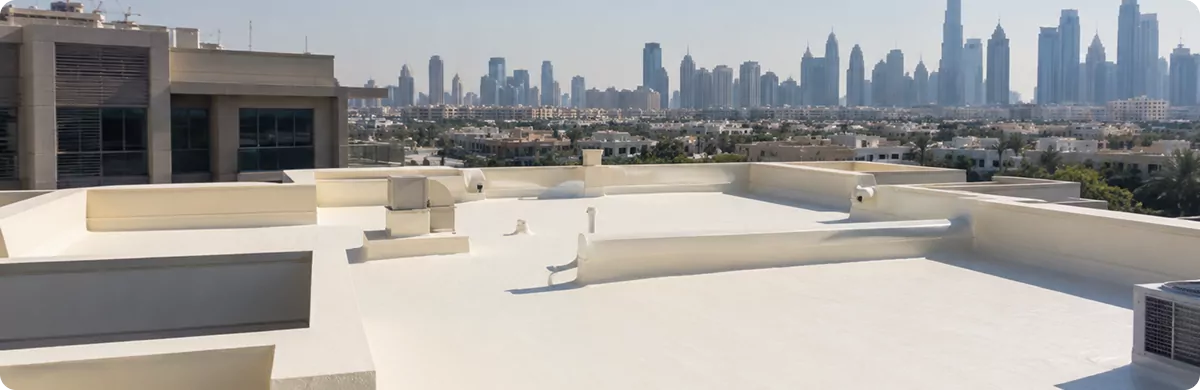 SPF insulation applied to a commercial flat roof overlooking the Dubai skyline
