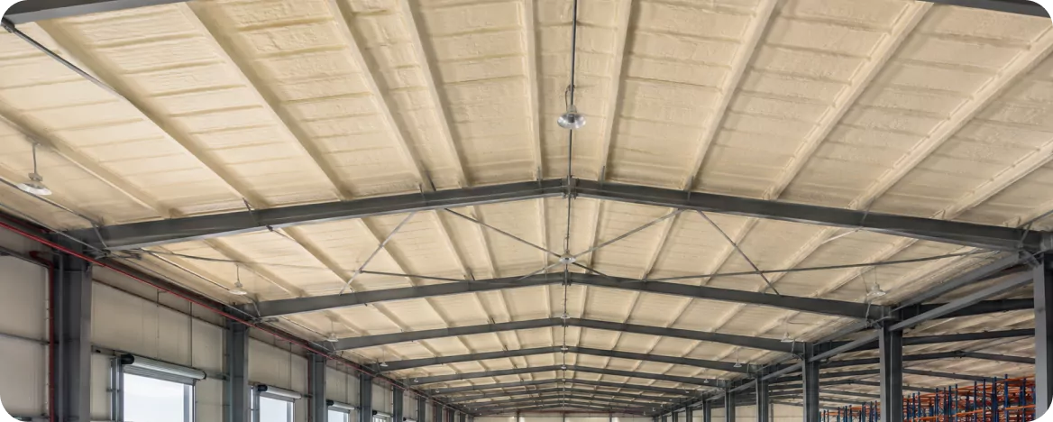 Warehouse roof structure insulated with spray polyurethane foam