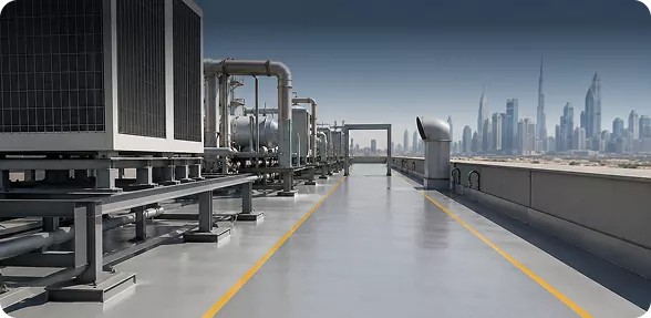 Protective topcoat on a walkway between rooftop plant equipment